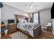 Bedroom with hardwood floors and ceiling fan at 880 Hillary Ln, Lawrenceville, GA 30043