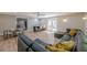 Spacious finished basement with a wet bar, cozy seating area, and stylish modern finishes at 4446 Huntington Cir, Atlanta, GA 30338