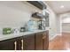 Kitchen nook featuring black cabinets, white countertop, and beverage station at 4446 Huntington Cir, Atlanta, GA 30338