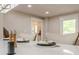 Bright kitchen featuring a sleek island with seating and modern appliances, designed for culinary enthusiasts at 4446 Huntington Cir, Atlanta, GA 30338