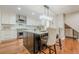 Gourmet kitchen featuring stainless steel appliances, a stylish range hood, and a bright, open layout at 4446 Huntington Cir, Atlanta, GA 30338