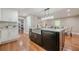 Modern kitchen with a large central island, stainless steel sink, and sleek countertops, great for cooking at 4446 Huntington Cir, Atlanta, GA 30338