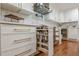 Well-organized kitchen with pull-out drawers, custom cabinetry, and modern fixtures for efficient storage at 4446 Huntington Cir, Atlanta, GA 30338