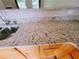 Close-up of granite countertops and stainless steel sink with wooden cabinets at 523 Lantern Wood Dr, Scottdale, GA 30079