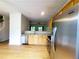 Open kitchen features stainless appliances, granite countertops and wooden cabinets at 523 Lantern Wood Dr, Scottdale, GA 30079