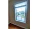 A bright window overlooking a street, enhancing natural light in the room at 523 Lantern Wood Dr, Scottdale, GA 30079