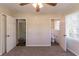 Bedroom with ceiling fan and openings for an ensuite and closet at 2062 Whites Mill Rd, Decatur, GA 30032