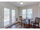 Cozy breakfast nook with french doors, natural light, and charming wood accents at 2228 Arbor Forest Sw Trl, Marietta, GA 30064