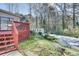 Backyard view with deck, steps and landscaped area at 3189 Terramar Dr, Atlanta, GA 30341