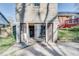 Back of house shows entrance into basement at 3189 Terramar Dr, Atlanta, GA 30341