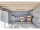 Basement wet bar with a vintage fridge, offering entertainment and extra storage at 3189 Terramar Dr, Atlanta, GA 30341