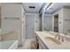 Classic bathroom with integrated shower and tub, ample vanity space, and a vintage aesthetic at 3189 Terramar Dr, Atlanta, GA 30341