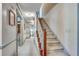 Hallway with carpeted stairs and access to several rooms within the home at 3189 Terramar Dr, Atlanta, GA 30341
