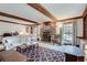 Cozy living room with stone fireplace and large windows provides ample natural light, perfect for relaxation at 3189 Terramar Dr, Atlanta, GA 30341