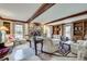 Spacious living room features a stone fireplace, built-in shelves and large windows, perfect for entertaining at 3189 Terramar Dr, Atlanta, GA 30341