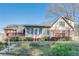 Backyard with deck, patio, enclosed sunroom, and lush greenery provide a peaceful retreat at 3189 Terramar Dr, Atlanta, GA 30341