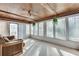 Bright sunroom featuring a wood plank ceiling and large windows at 3189 Terramar Dr, Atlanta, GA 30341