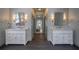 Luxurious primary bathroom with dual sinks, marble countertops, and modern fixtures at 320 N Drew Ct, Duluth, GA 30097