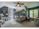 Charming bedroom featuring a novelty bed shaped like a playhouse and a ceiling fan at 320 N Drew Ct, Duluth, GA 30097