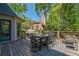 Outdoor deck with an outdoor kitchen and dining area at 320 N Drew Ct, Duluth, GA 30097