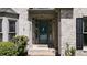 Inviting front entry features a decorative glass door and sidelights at 320 N Drew Ct, Duluth, GA 30097