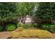 Parkside neighborhood stone sign surrounded by lush landscaping and greenery at 320 N Drew Ct, Duluth, GA 30097