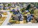 Aerial view of the house in a neighborhood with mature landscaping and well-maintained lawns at 401 Windstream Sw Dr, Marietta, GA 30060
