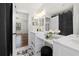 Elegant bathroom with double vanity, modern fixtures, and marble countertops at 401 Windstream Sw Dr, Marietta, GA 30060