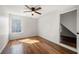 Bright bedroom showcasing hardwood floors, window, and ensuite entrance at 401 Windstream Sw Dr, Marietta, GA 30060