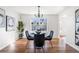 Cozy dining area featuring stylish chairs and a modern chandelier at 401 Windstream Sw Dr, Marietta, GA 30060