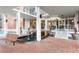 Building entrance with water feature, bench, and access to the lobby through glass doors at 130 26Th Nw St # 807, Atlanta, GA 30309