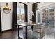 Cozy dining area with seating for two and balcony access, perfect for enjoying meals with a view at 206 11Th Ne St # 205, Atlanta, GA 30309