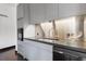 Modern kitchen with stainless steel appliances, sleek cabinetry, and a countertop sink, perfect for meal preparation at 206 11Th Ne St # 205, Atlanta, GA 30309