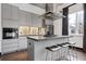 Modern kitchen with stainless steel appliances, sleek cabinetry, and a breakfast bar, perfect for culinary enthusiasts at 206 11Th Ne St # 205, Atlanta, GA 30309