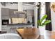 Sleek kitchen with a large island, stainless steel appliances, and modern decor, perfect for cooking and entertaining at 206 11Th Ne St # 205, Atlanta, GA 30309