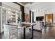 Bright living area with a dining space, comfortable seating, and a balcony, seamlessly blending indoor and outdoor living at 206 11Th Ne St # 205, Atlanta, GA 30309