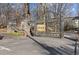 Historic gate entrance to a park with stone pillars and mature trees along the roadway at 206 11Th Ne St # 205, Atlanta, GA 30309