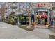 Charming restaurant exterior with colorful decorations and outdoor seating, B.O.T is on the sign at 206 11Th Ne St # 205, Atlanta, GA 30309