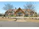 Gorgeous clubhouse with stone and wood accents offers a welcoming community space at 2910 Bishopstone Way, Cumming, GA 30040