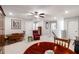 Bright upper level living room featuring neutral carpeting and lots of room for entertaining at 2910 Bishopstone Way, Cumming, GA 30040