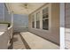 Relaxing front porch perfect for enjoying the outdoors with ceiling fan at 4571 Parkway Cir, Atlanta, GA 30349