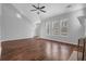 Bright living room boasting hardwood floors, a fireplace, and large windows at 4571 Parkway Cir, Atlanta, GA 30349