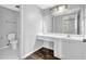 Bathroom showcasing a spacious vanity and tiled flooring at 617 Creekstone Ct, Jonesboro, GA 30236