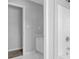 Bathroom featuring a shower and a white vanity, with neutral walls and flooring at 617 Creekstone Ct, Jonesboro, GA 30236