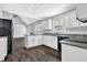 Updated kitchen with granite countertops, white cabinets, and stainless steel appliances at 617 Creekstone Ct, Jonesboro, GA 30236