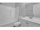 A bathroom with a toilet, bathtub, and vanity with mirror at 8633 Hilltop Rd, Jonesboro, GA 30236