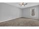 Spacious bedroom featuring a large window and neutral tones at 8633 Hilltop Rd, Jonesboro, GA 30236