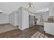 Modern kitchen with stainless steel appliances and sleek white cabinets at 8633 Hilltop Rd, Jonesboro, GA 30236