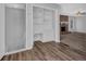 Inviting living room with a cozy fireplace and built-in desk at 8633 Hilltop Rd, Jonesboro, GA 30236