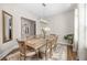 Bright dining room with wood table, chandelier and large windows for natural light at 1929 Finnish Ln, Kennesaw, GA 30152